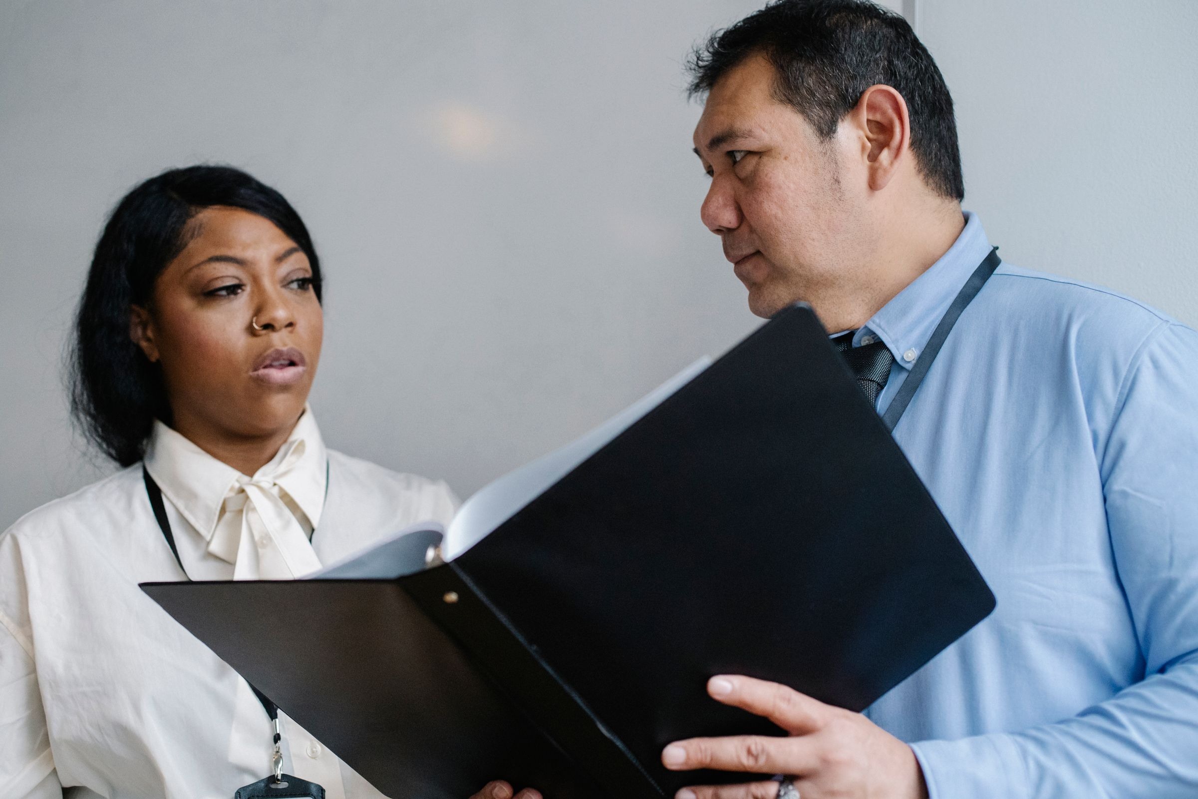 Professional reviewing a shipment document file