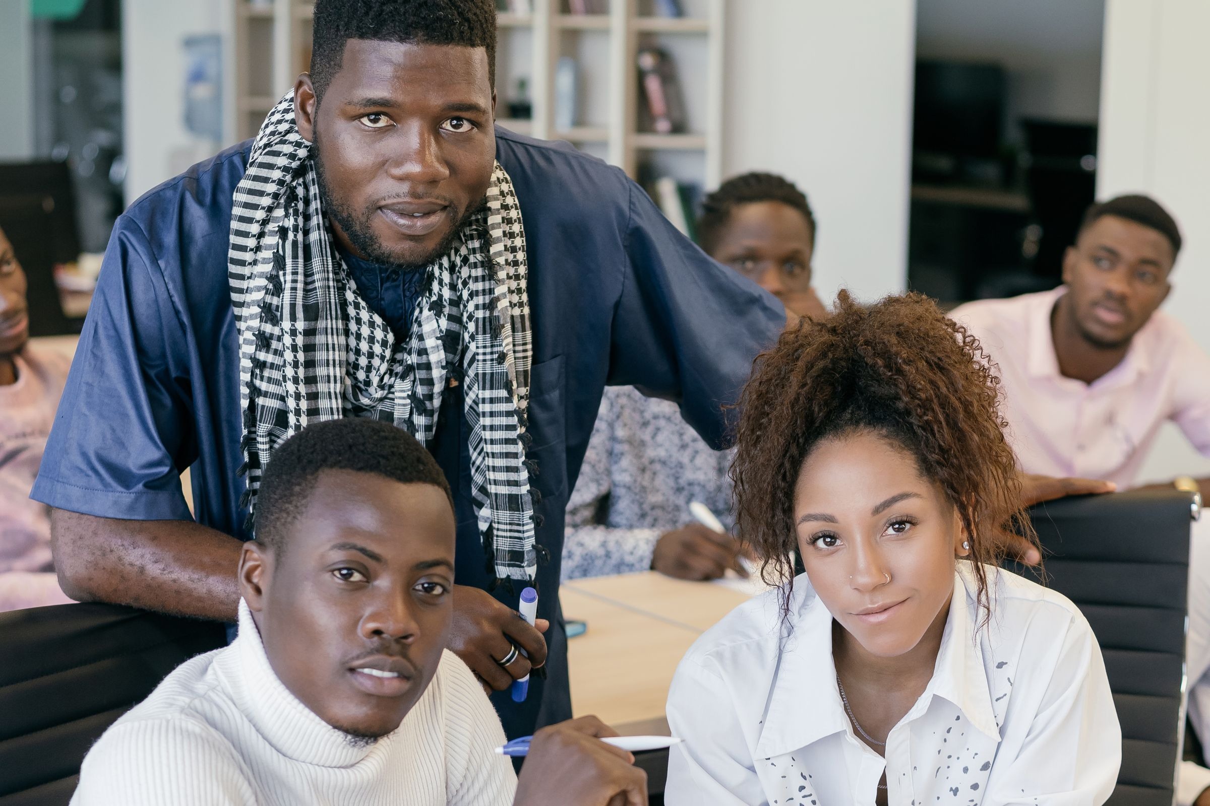 African professional men and women collaborating