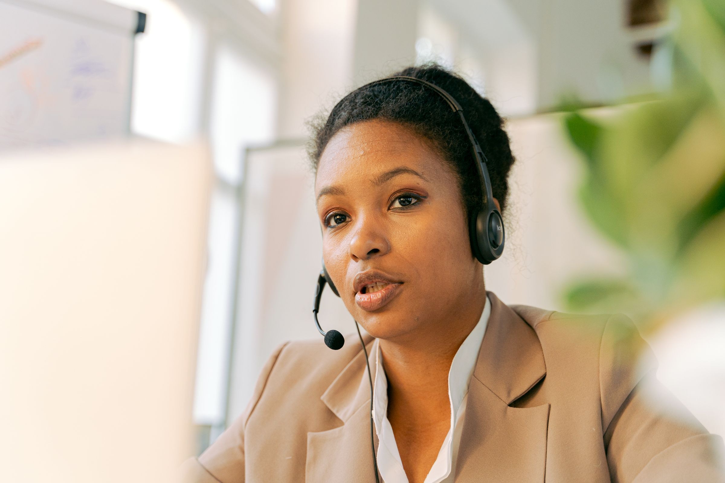 African American customer support professional with headset
