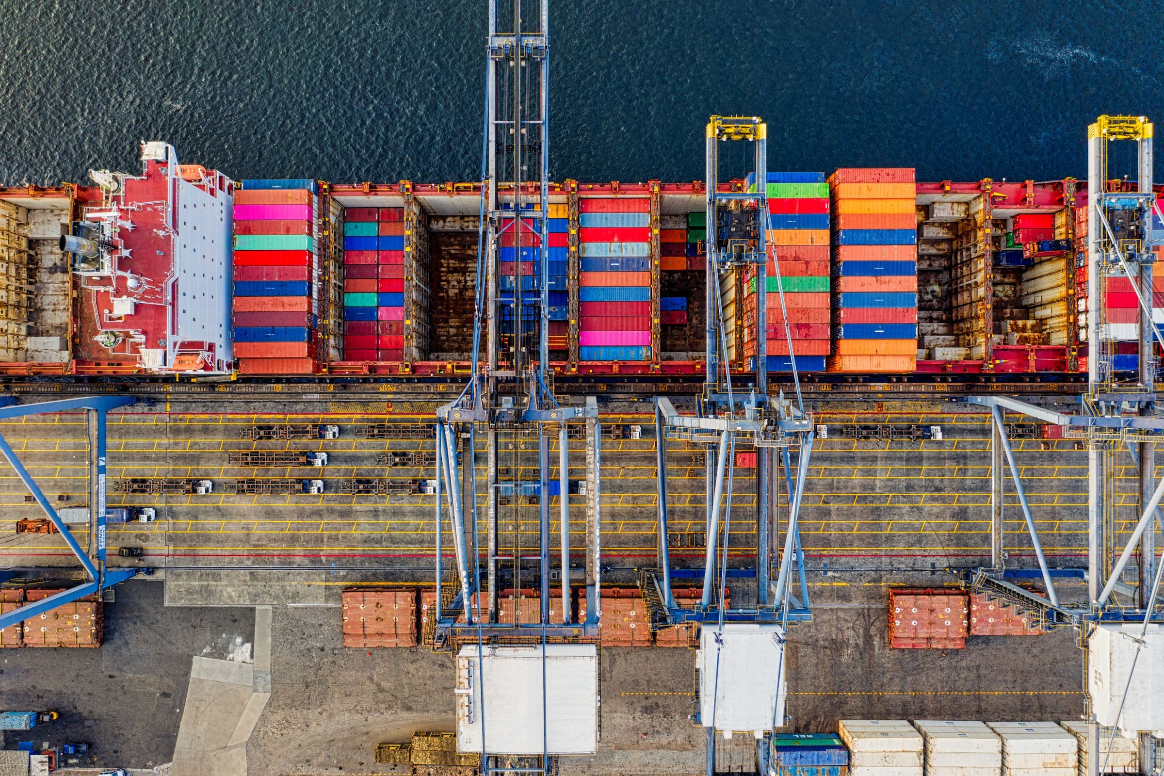 Aerial view of a container ship and freight terminal