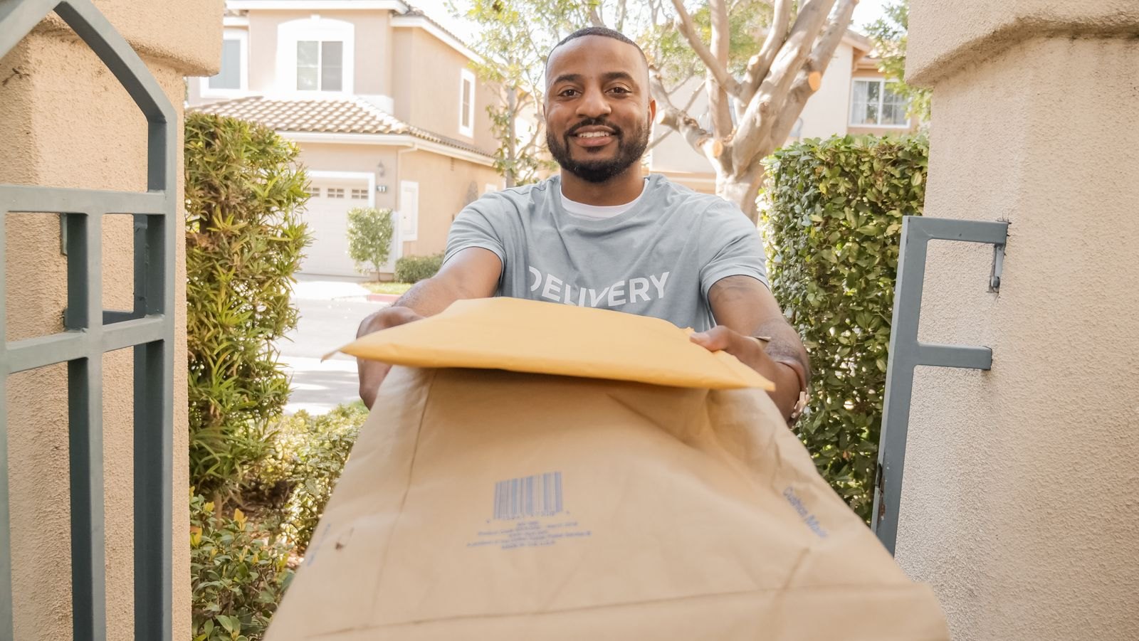 Delivery worker handing over packages