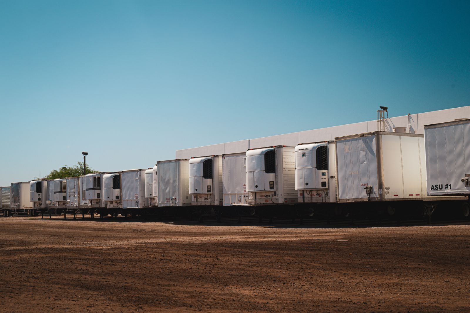 Parked refrigerated trailers with cooling units