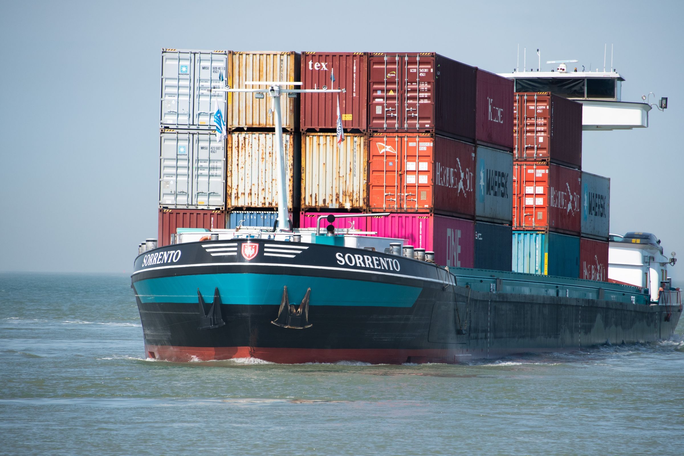Container ship carrying freight at sea