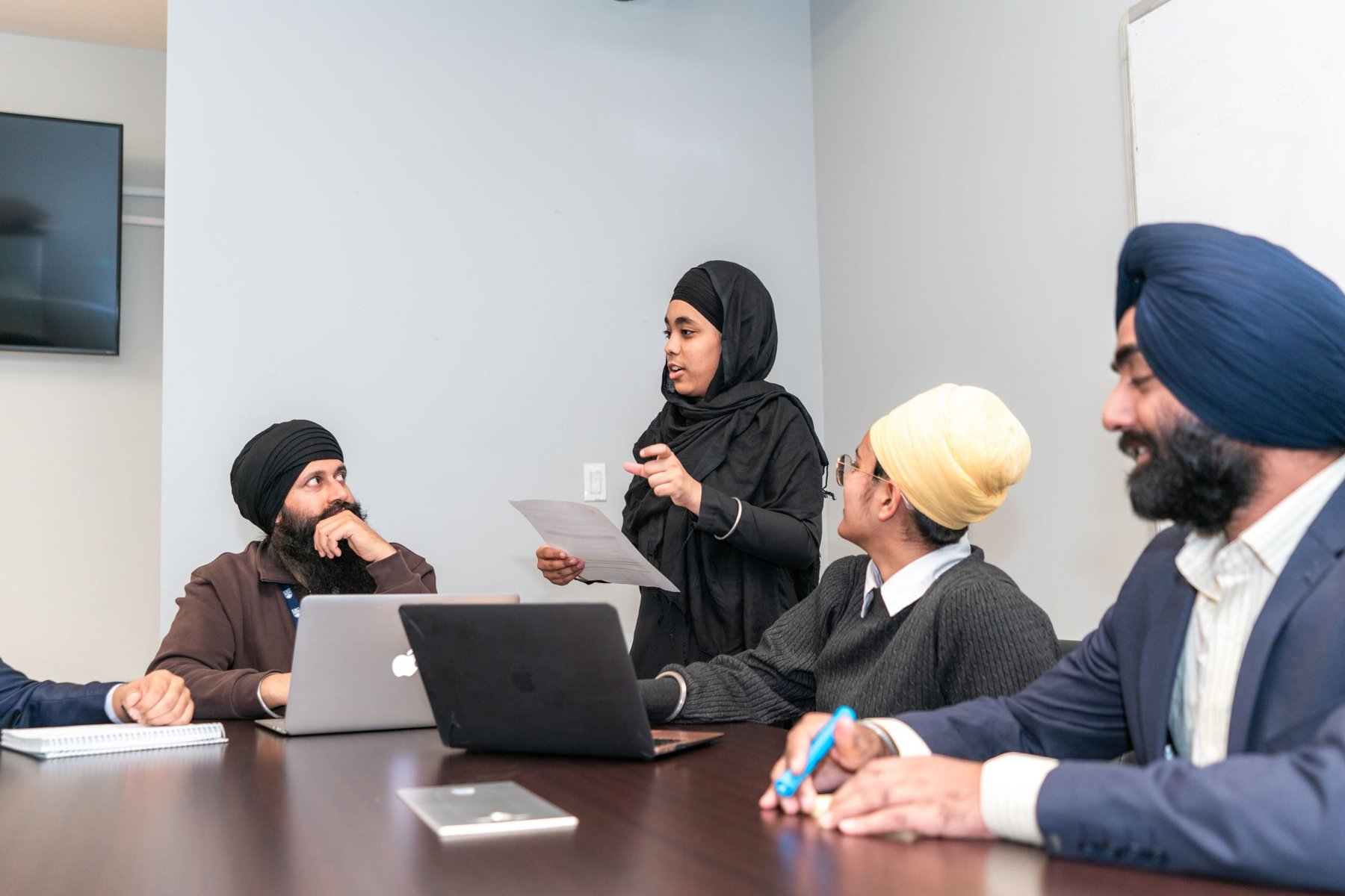 Real men and women in a professional planning meeting