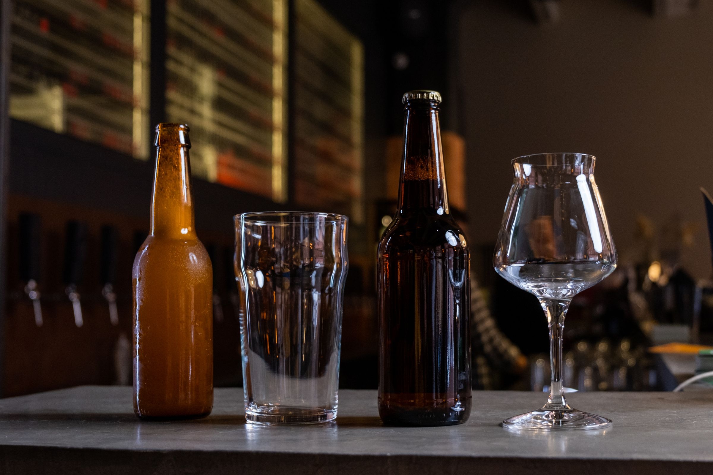 Unbranded craft beer bottles and glasses